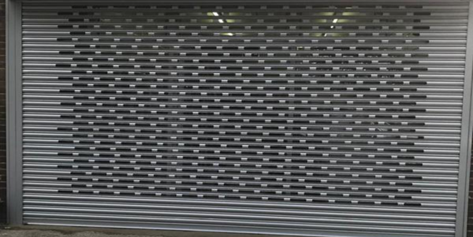 Roller shutter installation by Range Shop Fronts